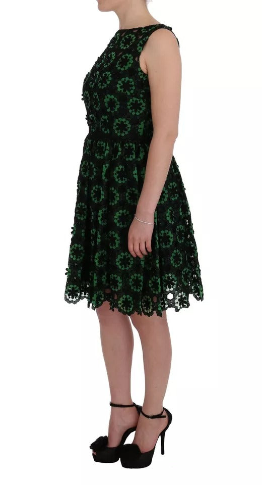 Indulge in the exquisite Dolce & Gabbana Green Floral Ricamo A-Line Shift Dress, where luxurious silk and cotton blend create an enchanting silhouette for unforgettable moments.
