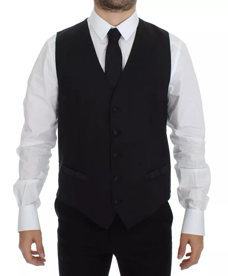 Indulge in the exquisite Dolce & Gabbana Black Wool Silk Dress Gilet Jacket Vest, a timeless statement of luxury and elegance, crafted for the discerning individual.