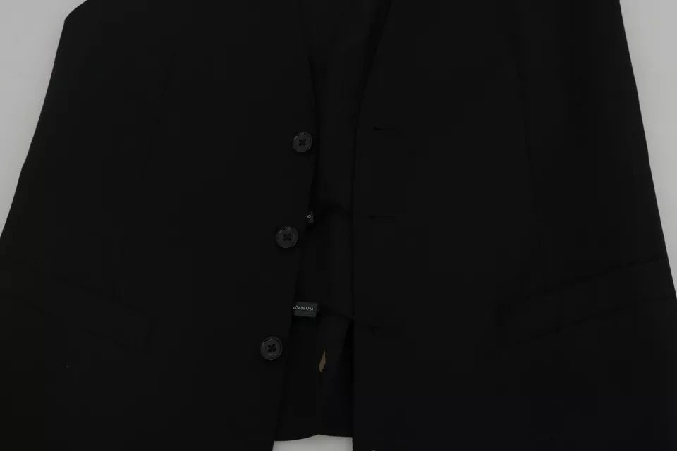 Indulge in the exquisite Dolce & Gabbana Black Wool Logo Waistcoat Vest, a timeless piece of Italian craftsmanship that elevates your sophisticated style with luxurious elegance.