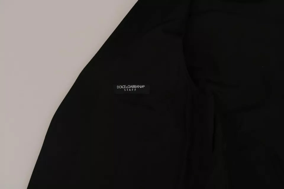 Indulge in the exquisite Dolce & Gabbana Black Wool Logo Waistcoat Vest, a testament to Italian craftsmanship, merging timeless elegance with modern sophistication for the discerning individual.