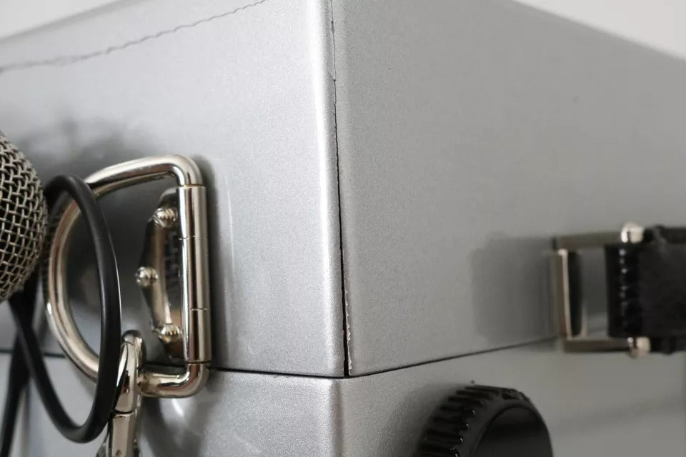 Discover the exquisite Dolce & Gabbana Silver Retro Radio Boombox, a limited edition masterpiece crafted from luxurious wood and leather, embodying timeless elegance and artisanal quality.