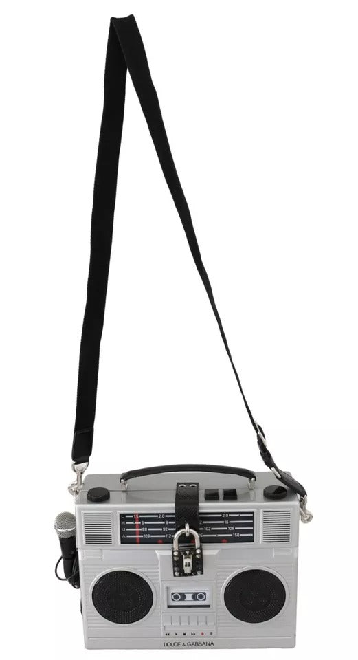 Indulge in the exquisite Dolce & Gabbana Silver Retro Radio Boombox, a limited edition masterpiece of artisanal craftsmanship in luxurious wood and leather, perfect for the discerning connoisseur.