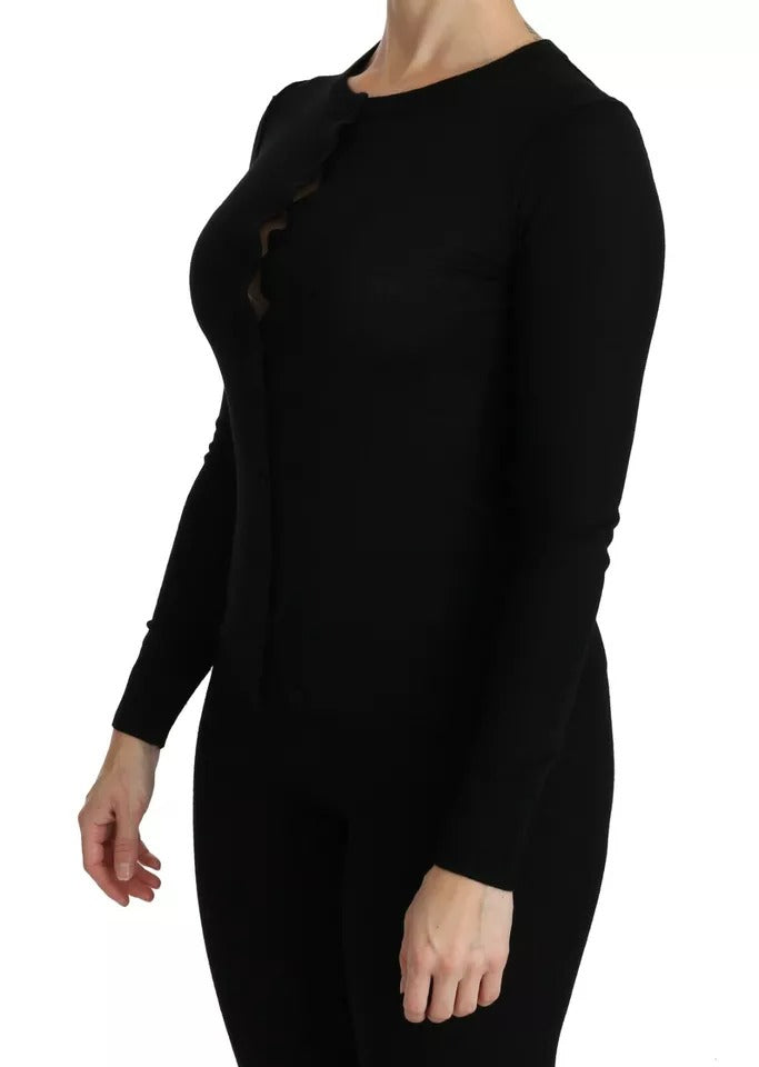 Experience the allure of Dolce & Gabbana's Black Virgin Wool Long Sleeve Top, a masterpiece of Italian craftsmanship that embodies timeless elegance and sophisticated luxury.