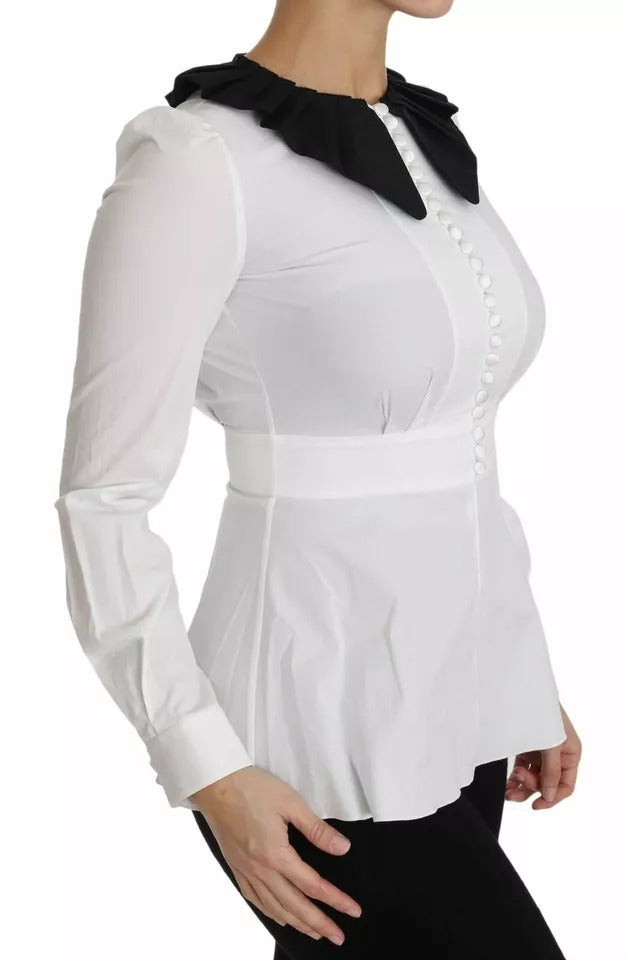 Elevate your wardrobe with the Dolce & Gabbana Black White Decorative Buttons Blouse, a masterpiece of Italian craftsmanship in luxurious cotton and elastane.
