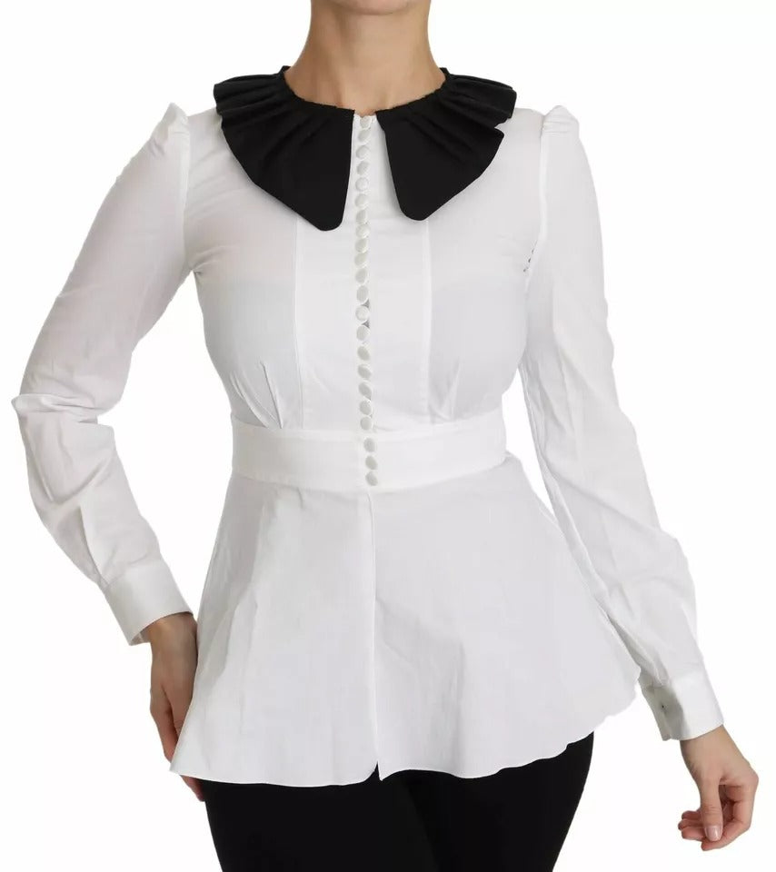 Experience the allure of Dolce & Gabbana's exquisite Black White Decorative Buttons Blouse, crafted from luxurious cotton and elastane, embodying timeless elegance and Italian craftsmanship.