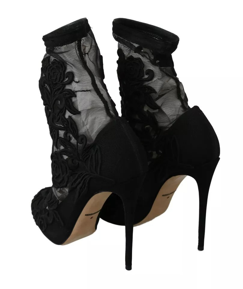 Indulge in the exquisite allure of Dolce & Gabbana Black Tulle Stretch Floral Booties, where luxurious tulle and artisanal craftsmanship redefine elegance for the discerning connoisseur.