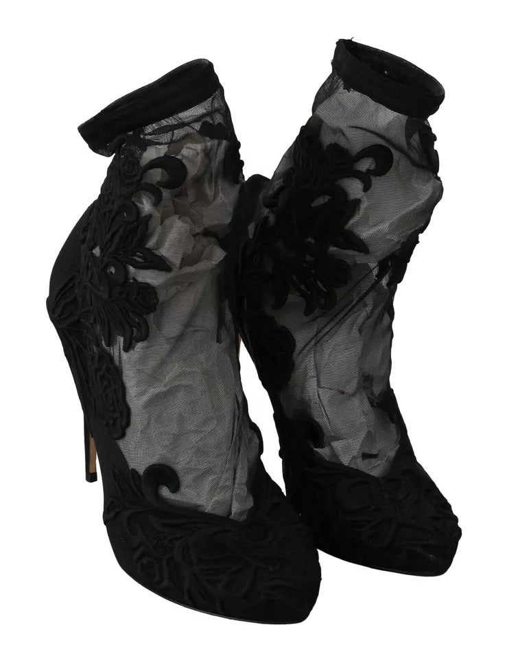 Elevate your style with Dolce & Gabbana Black Tulle Stretch Floral Booties, crafted in Italy from exquisite tulle and elastane, embodying luxury and sophistication.