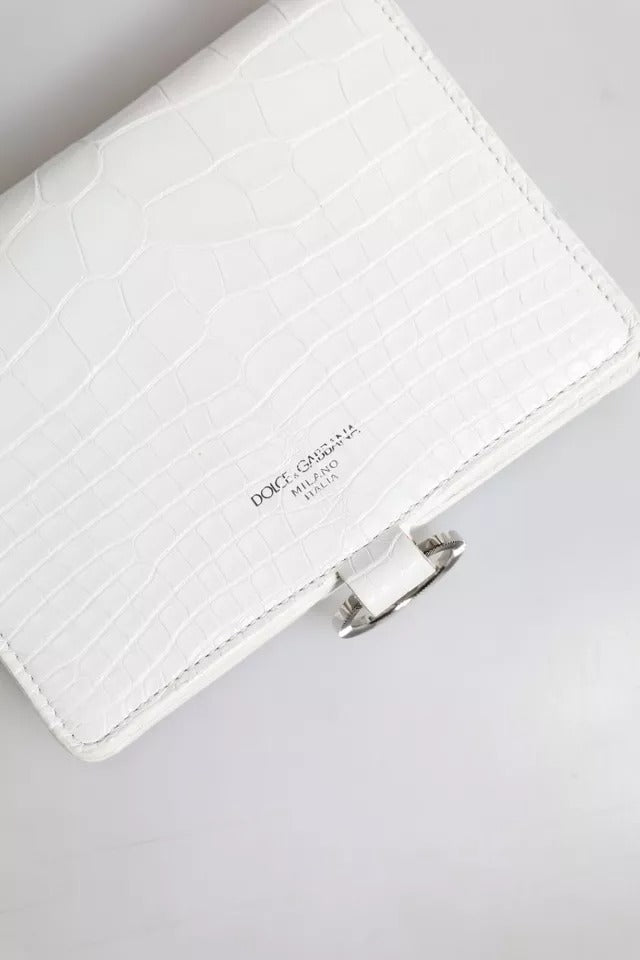 Discover the exquisite Dolce & Gabbana White Blue Leather Bifold Crossbody Sling Wallet, a masterpiece of Italian craftsmanship, embodying luxury and timeless elegance.