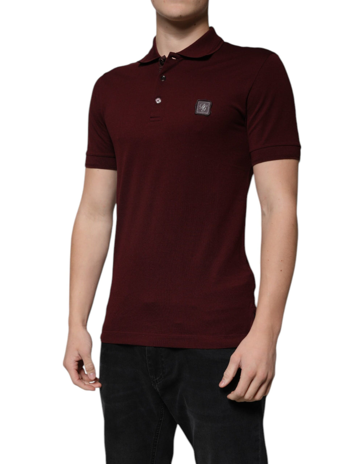 Elevate your wardrobe with the Dolce & Gabbana Maroon Collared Short Sleeves Polo T-shirt, crafted from a luxurious cotton blend, embodying timeless sophistication and exquisite craftsmanship.
