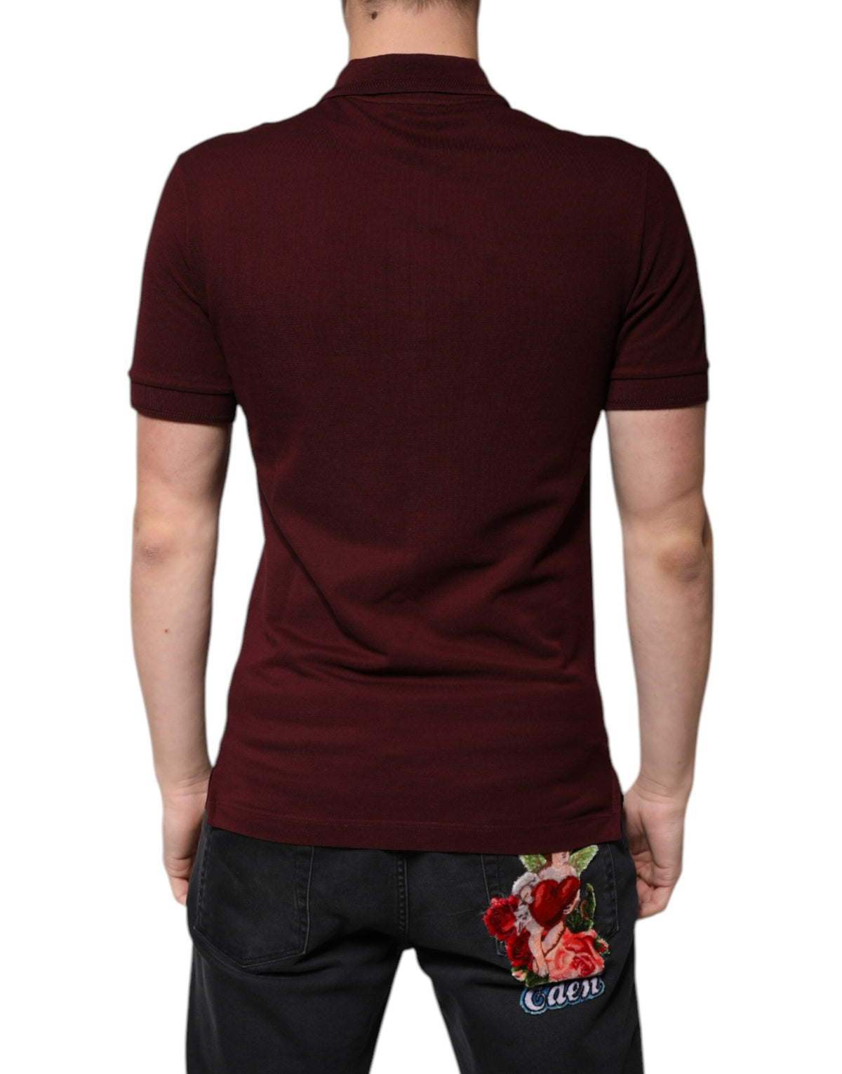 Elevate your wardrobe with the Dolce & Gabbana Maroon Collared Short Sleeves Polo T-shirt, a masterpiece of Italian craftsmanship in luxurious cotton blend, perfect for discerning tastes.