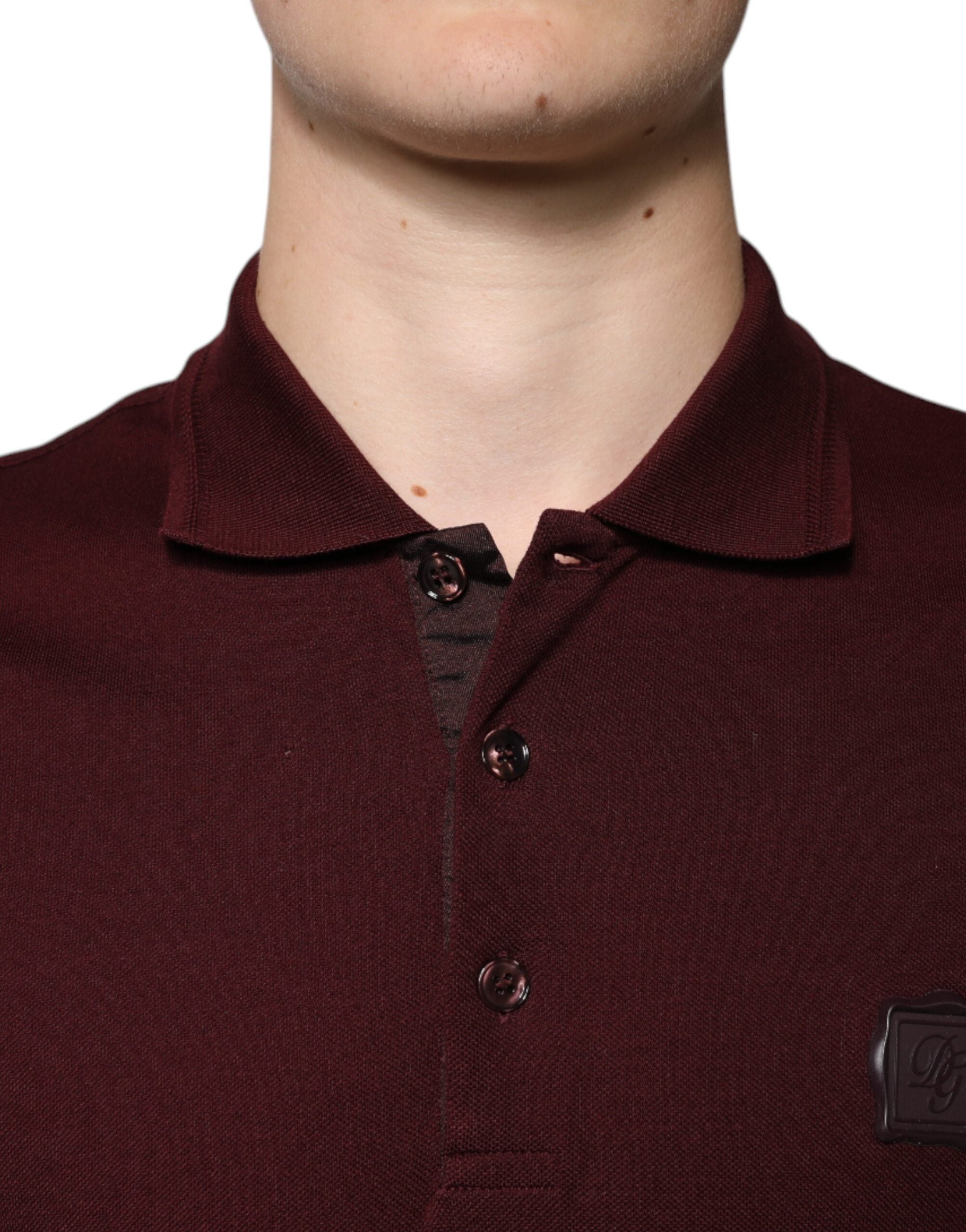 Elevate your wardrobe with the Dolce & Gabbana Maroon Collared Short Sleeves Polo T-shirt, crafted from a luxurious cotton blend for timeless sophistication and allure.