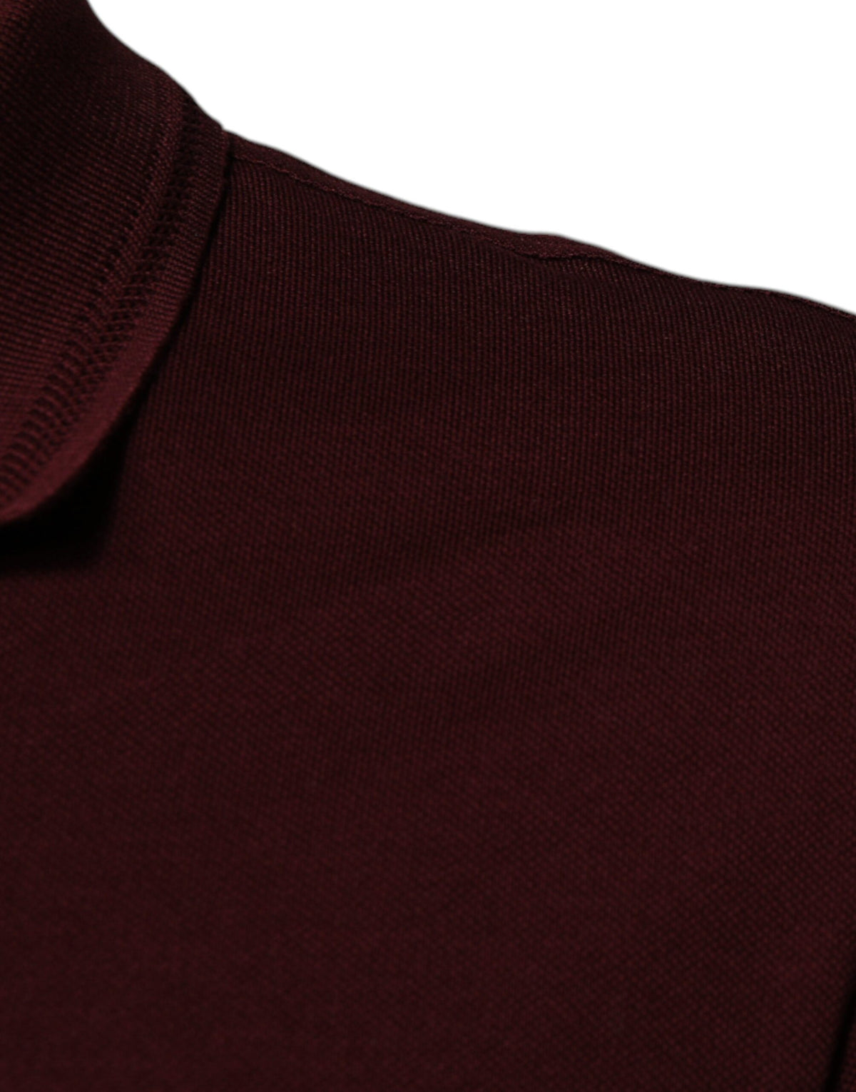 Elevate your wardrobe with the Dolce & Gabbana Maroon Collared Short Sleeves Polo T-shirt, a luxurious blend of cotton and polyester, embodying timeless sophistication and exquisite craftsmanship.