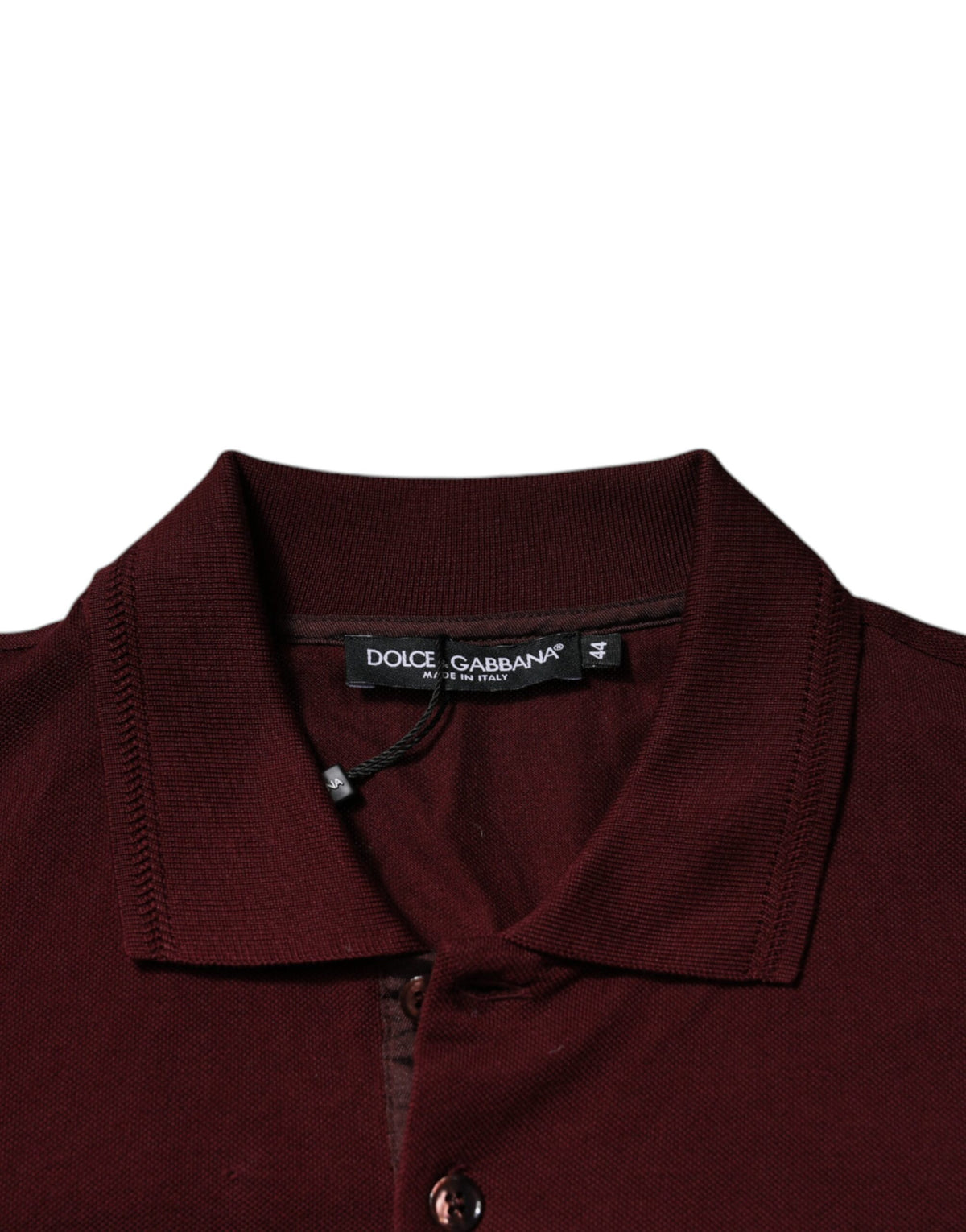 Elevate your style with the Dolce & Gabbana Maroon Collared Short Sleeves Polo T-shirt, crafted from a luxurious cotton blend, embodying sophistication and timeless elegance.