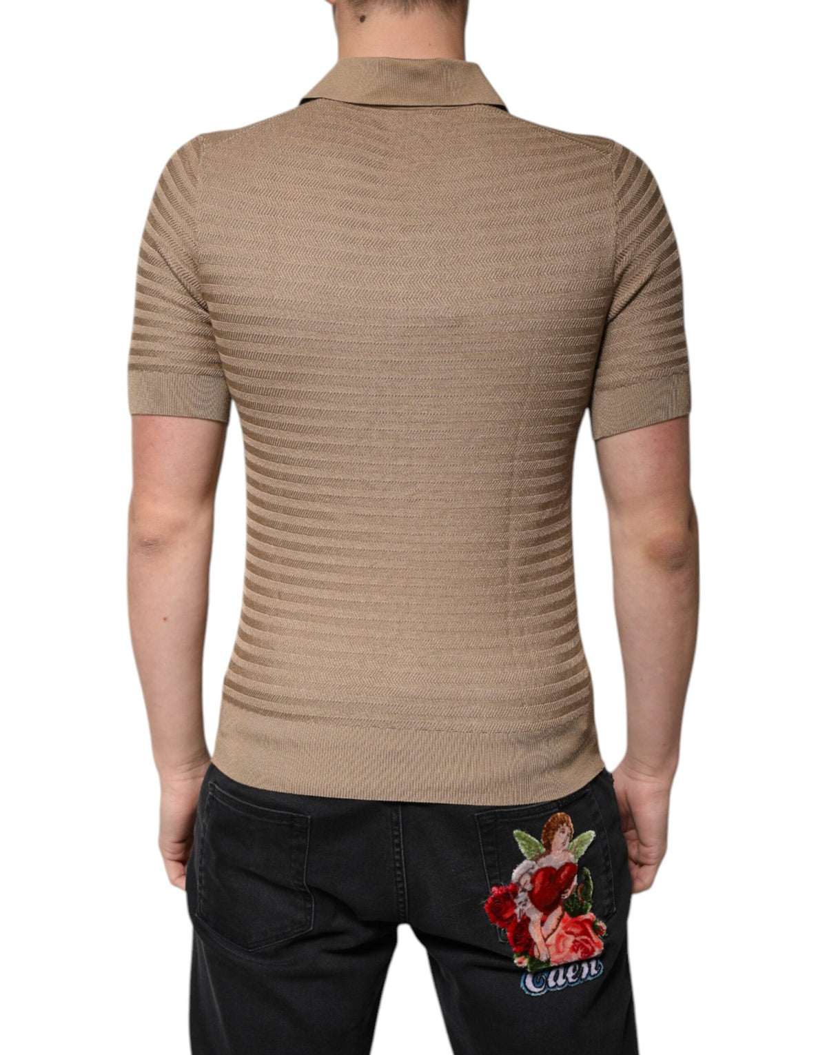 Indulge in the Dolce & Gabbana Brown Collared Silk Polo T-shirt, where exquisite silk meets timeless elegance, embodying sophistication for the discerning individual.