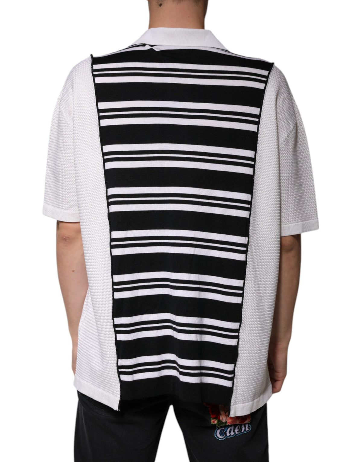 Indulge in the exquisite Dolce & Gabbana Black White Stripes Collared Polo T-shirt, a luxurious blend of silk and cashmere, embodying timeless elegance and modern sophistication.