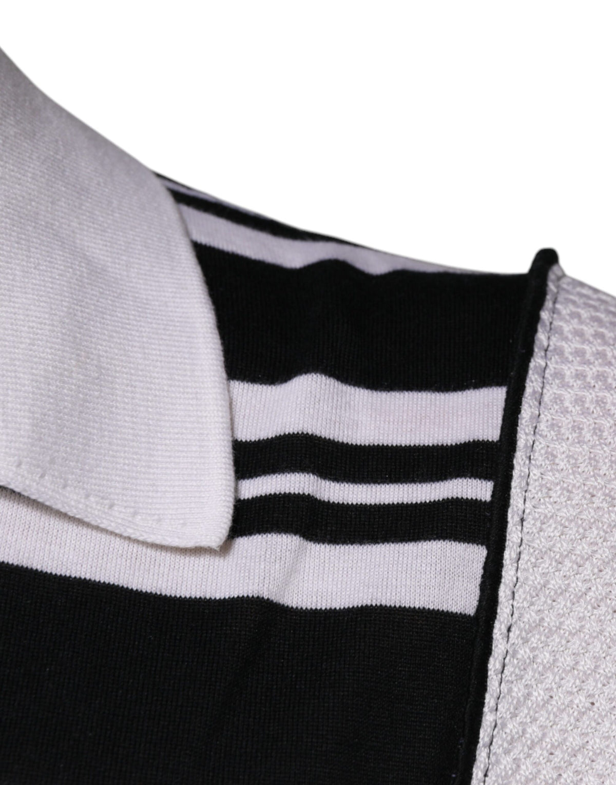 Indulge in the exquisite Dolce & Gabbana Black White Stripes Collared Polo T-shirt, a luxurious blend of silk and cashmere, embodying timeless elegance and modern sophistication.