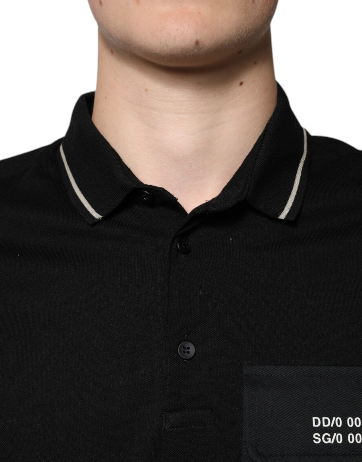 Indulge in the timeless elegance of the Dolce & Gabbana Black White Cotton Short Sleeves Polo T-shirt, where luxurious craftsmanship meets sophisticated style for the discerning individual.