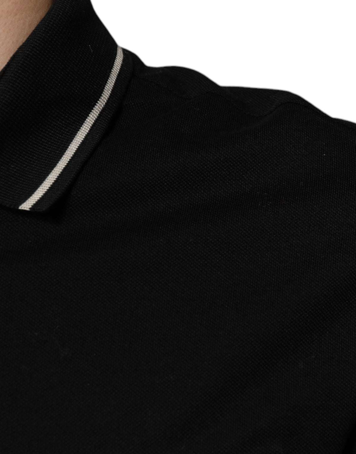 Indulge in the exquisite Dolce & Gabbana Black White Cotton Short Sleeves Polo T-shirt, a timeless blend of luxury and sophistication, crafted for the discerning individual.