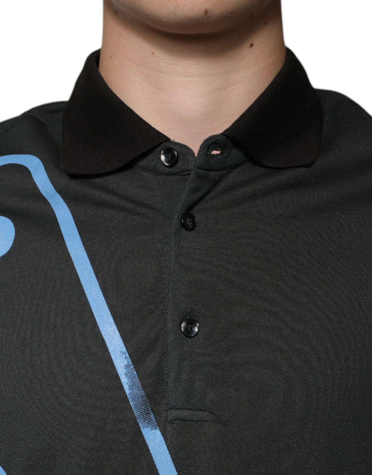 Indulge in the exquisite Dolce & Gabbana Black Logo Print Collared Cotton Polo T-shirt, a masterpiece of Italian craftsmanship that embodies timeless elegance and refined sophistication.