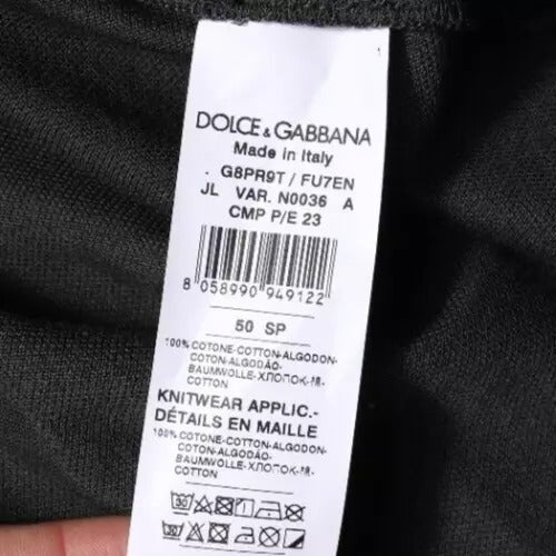 Indulge in the exquisite Dolce & Gabbana Black Logo Print Collared Cotton Polo T-shirt, a timeless piece embodying luxury and sophistication, crafted in Italy from 100% cotton.