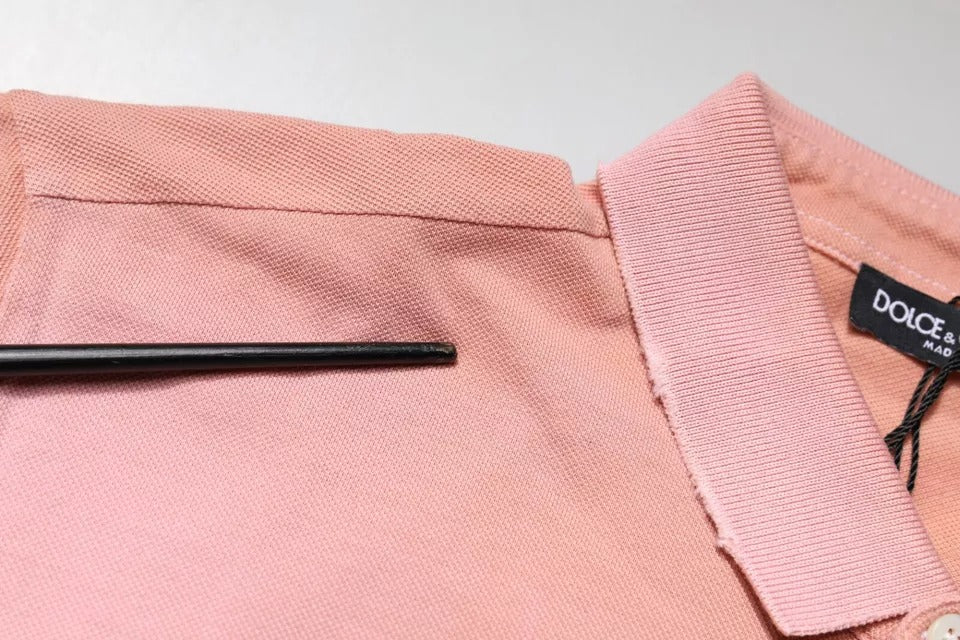 Elevate your wardrobe with the Dolce & Gabbana Pink Crown Collared Polo T-shirt, a testament to Italian craftsmanship in luxurious cotton, embodying sophistication and style.