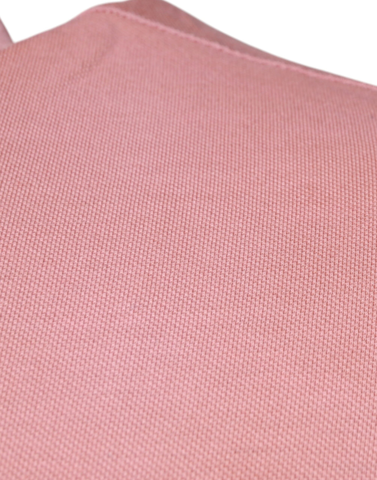 Elevate your wardrobe with the Dolce & Gabbana Pink Crown Collared Polo, crafted from luxurious Italian cotton, embodying sophistication and artisanal elegance.