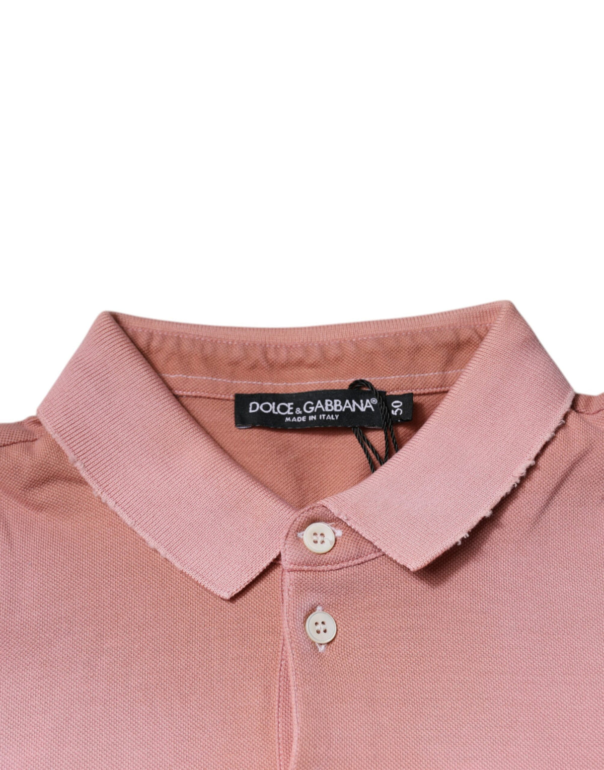 Elevate your wardrobe with the Dolce & Gabbana Pink Crown Collared Polo, crafted from luxurious Italian cotton, embodying sophistication and artisanal elegance.