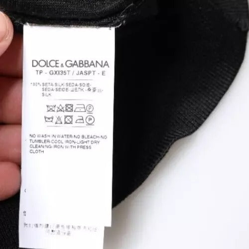 Indulge in the exquisite Dolce & Gabbana Multicolor Camouflage Collared Polo T-shirt, crafted from luxurious silk, embodying timeless elegance and sophisticated allure.