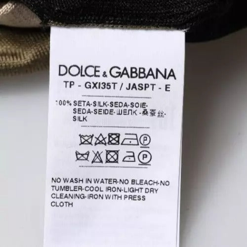 Indulge in the exquisite Dolce & Gabbana Multicolor Camouflage Collared Polo T-shirt, a silk masterpiece that embodies luxury and sophistication for the discerning individual.