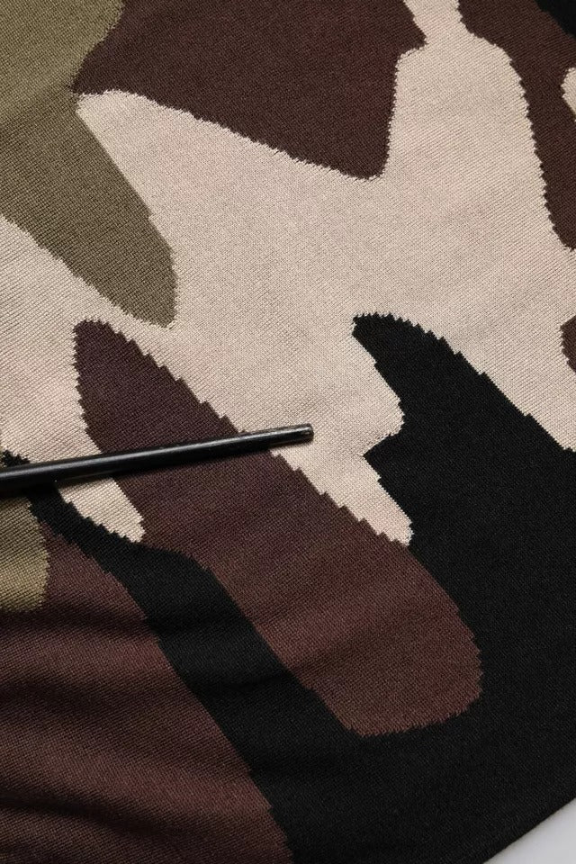 Indulge in the exquisite Dolce & Gabbana Multicolor Camouflage Polo, crafted from luxurious silk, embodying sophistication and timeless elegance for the discerning individual.