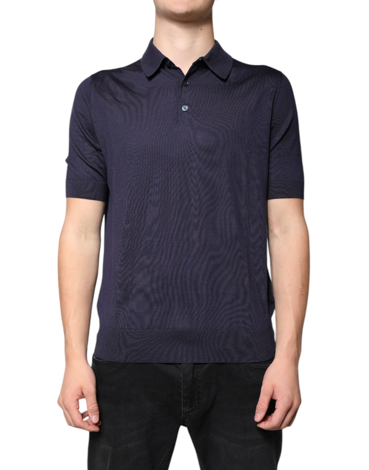 Indulge in the exquisite Dolce & Gabbana Blue Silk Collared Short Sleeves Polo T-shirt, a masterpiece of Italian craftsmanship that embodies timeless luxury and elegance.