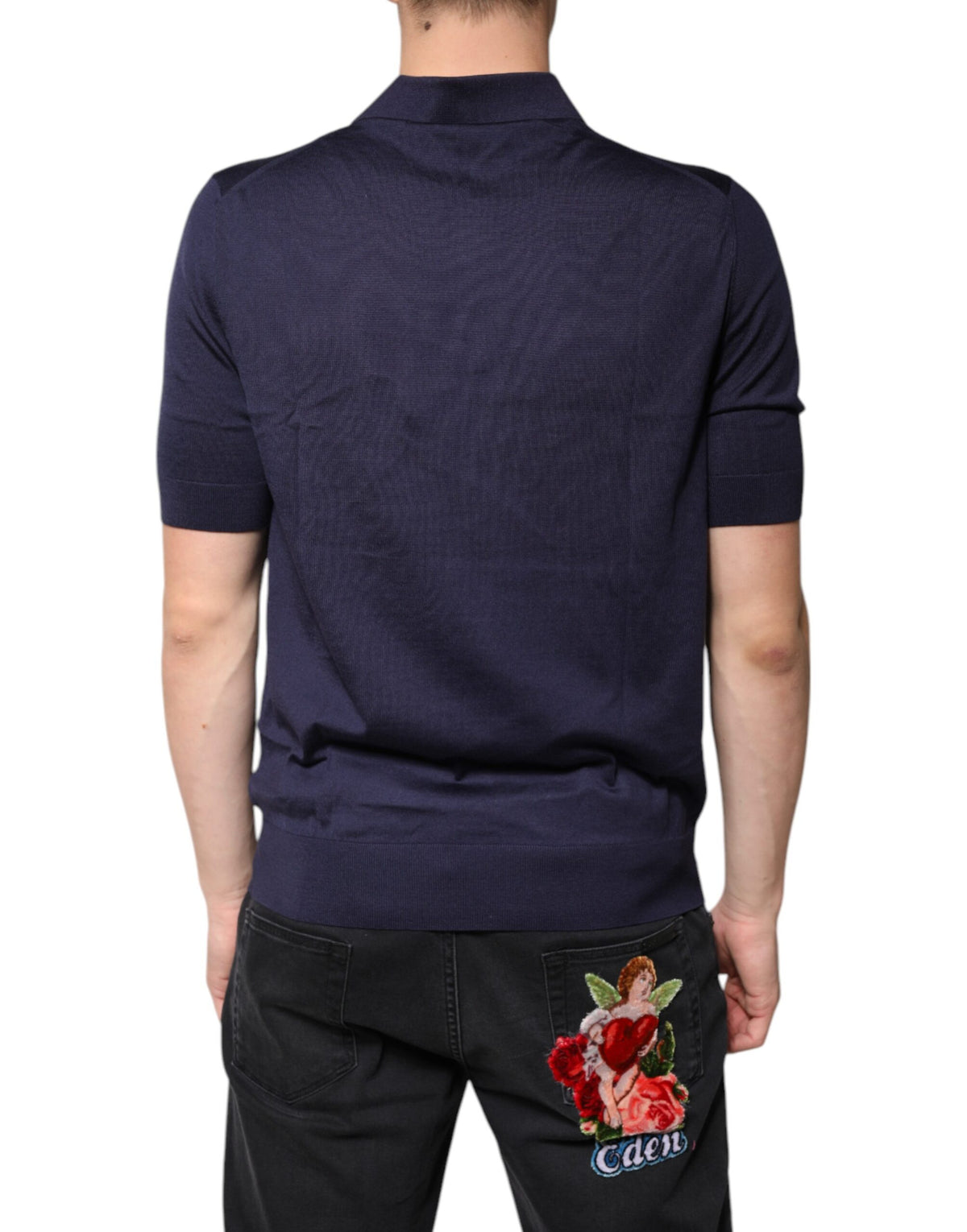 Indulge in the exquisite Dolce & Gabbana Blue Silk Collared Short Sleeves Polo T-shirt, a masterpiece of Italian craftsmanship that embodies timeless luxury and sophistication.