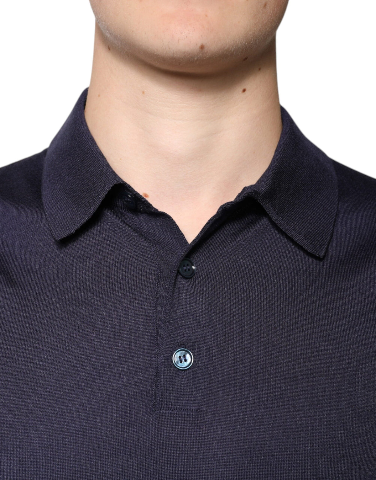 Indulge in the Dolce & Gabbana Blue Silk Collared Short Sleeves Polo T-shirt, a masterpiece of Italian craftsmanship that embodies timeless elegance and modern luxury.