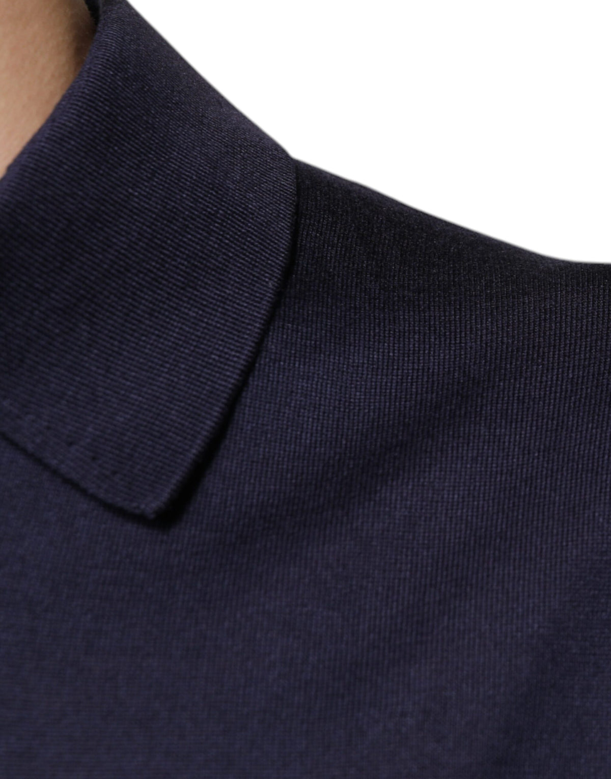 Indulge in the exquisite Dolce & Gabbana Blue Silk Collared Short Sleeves Polo T-shirt, a testament to Italian craftsmanship that elevates your style with timeless elegance.