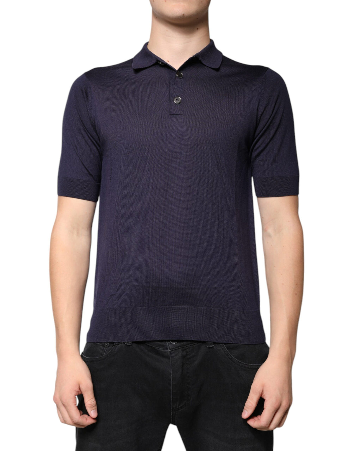 Discover the Dolce & Gabbana Blue Silk Collared Short Sleeves Polo T-shirt, a testament to Italian craftsmanship that embodies elegance and allure for the discerning individual.