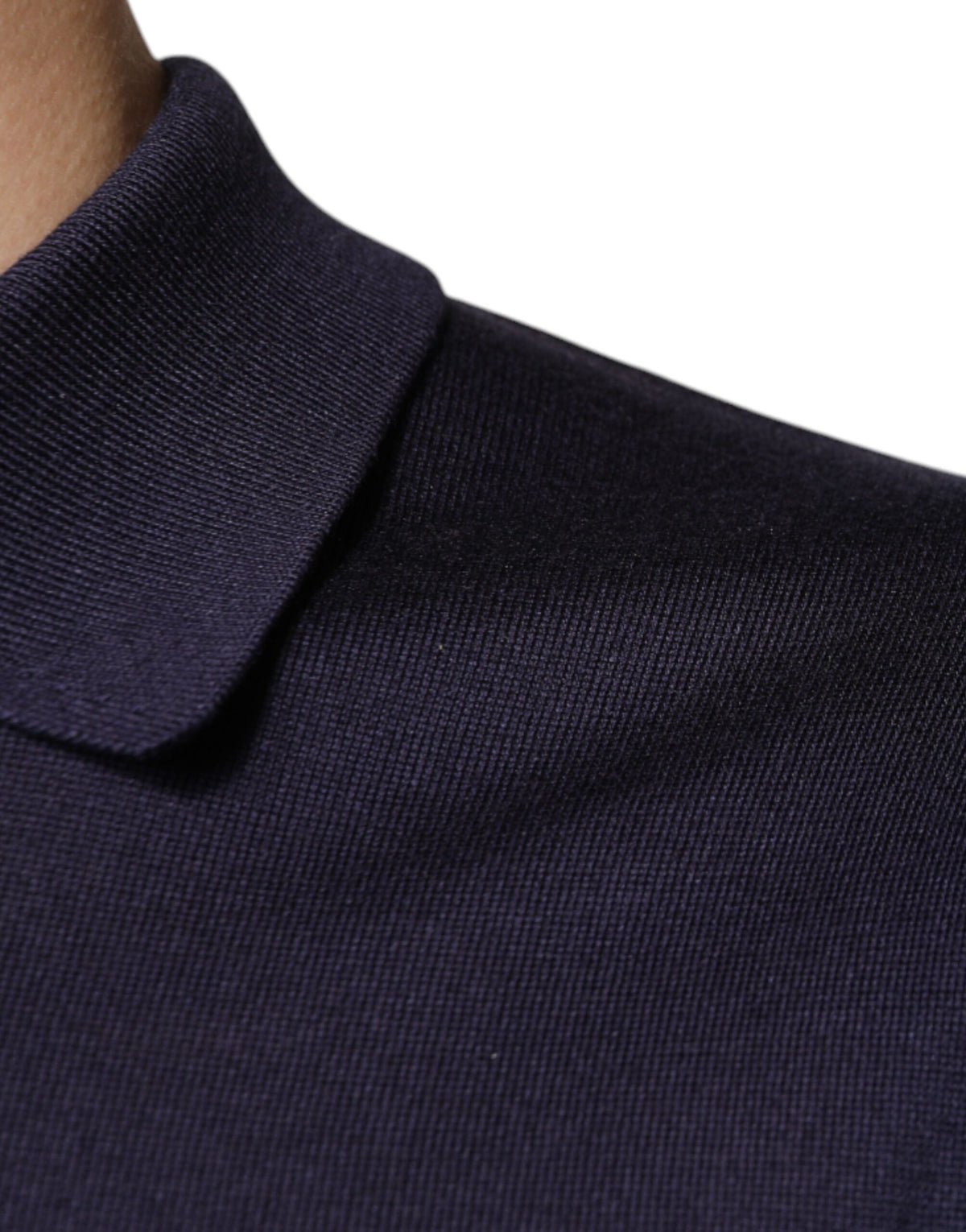 Indulge in the exquisite Dolce & Gabbana Blue Silk Collared Short Sleeves Polo T-shirt, a luxurious embodiment of Italian craftsmanship that elevates your style with timeless elegance.