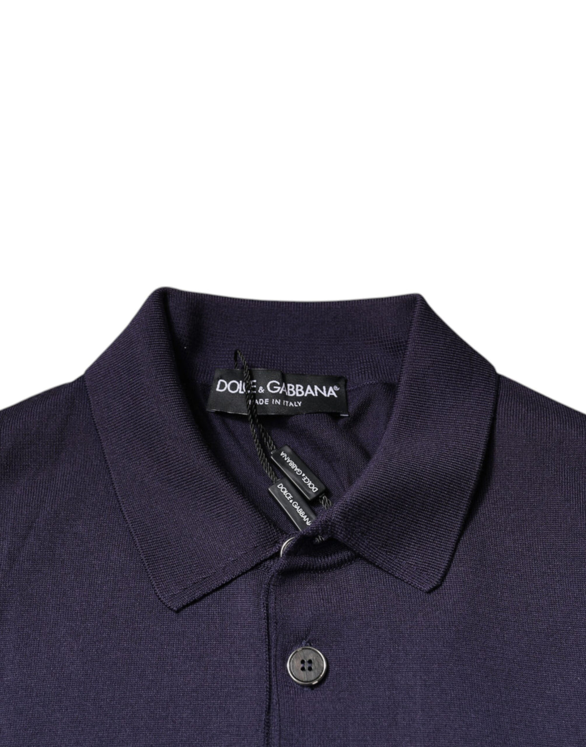 Experience the allure of the Dolce & Gabbana Blue Silk Collared Short Sleeves Polo T-shirt, a testament to Italian craftsmanship that redefines luxury and elegance.