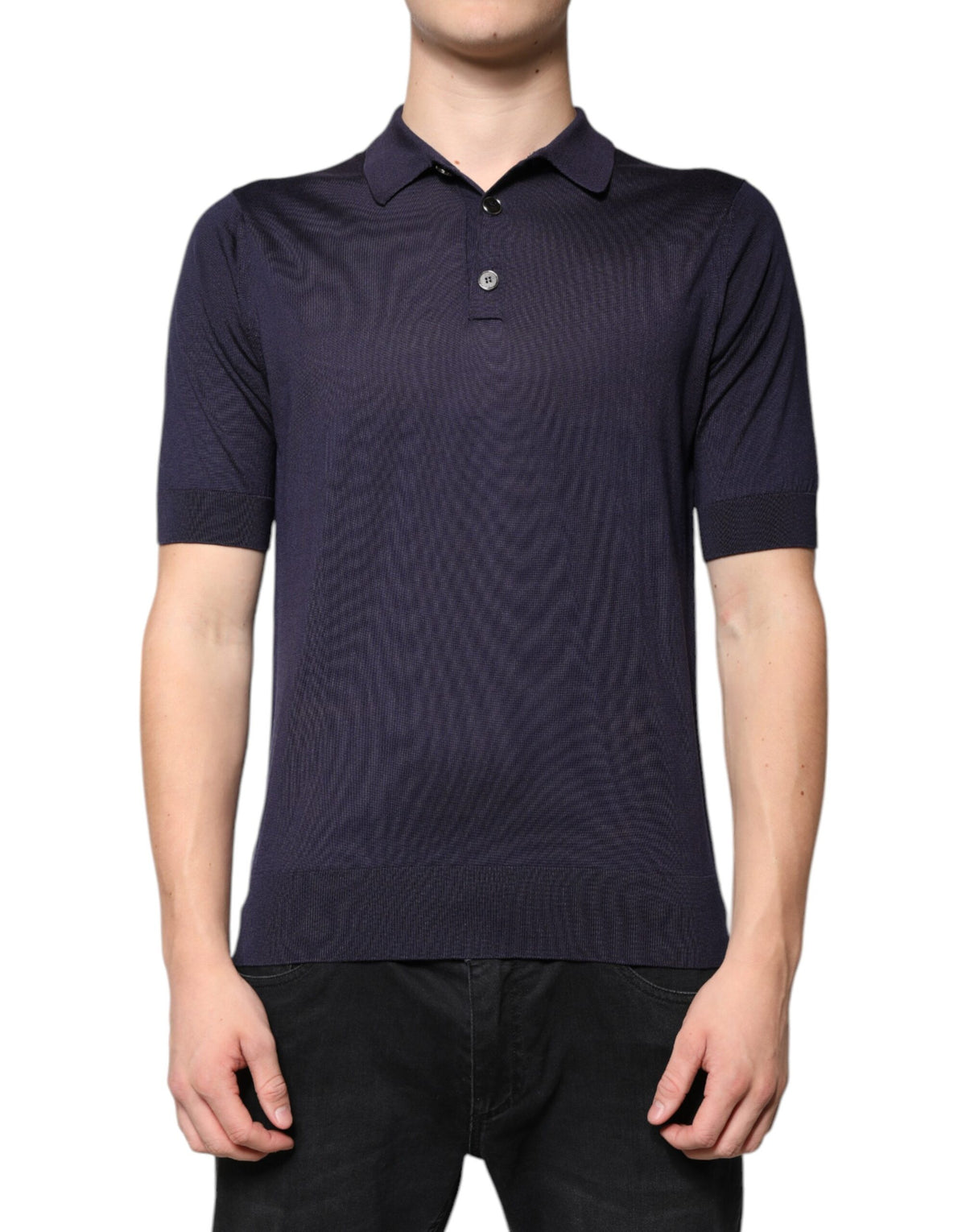 Indulge in the exquisite allure of Dolce & Gabbana's Blue Silk Collared Polo T-shirt, a timeless masterpiece of Italian craftsmanship that elevates every moment with luxurious elegance.