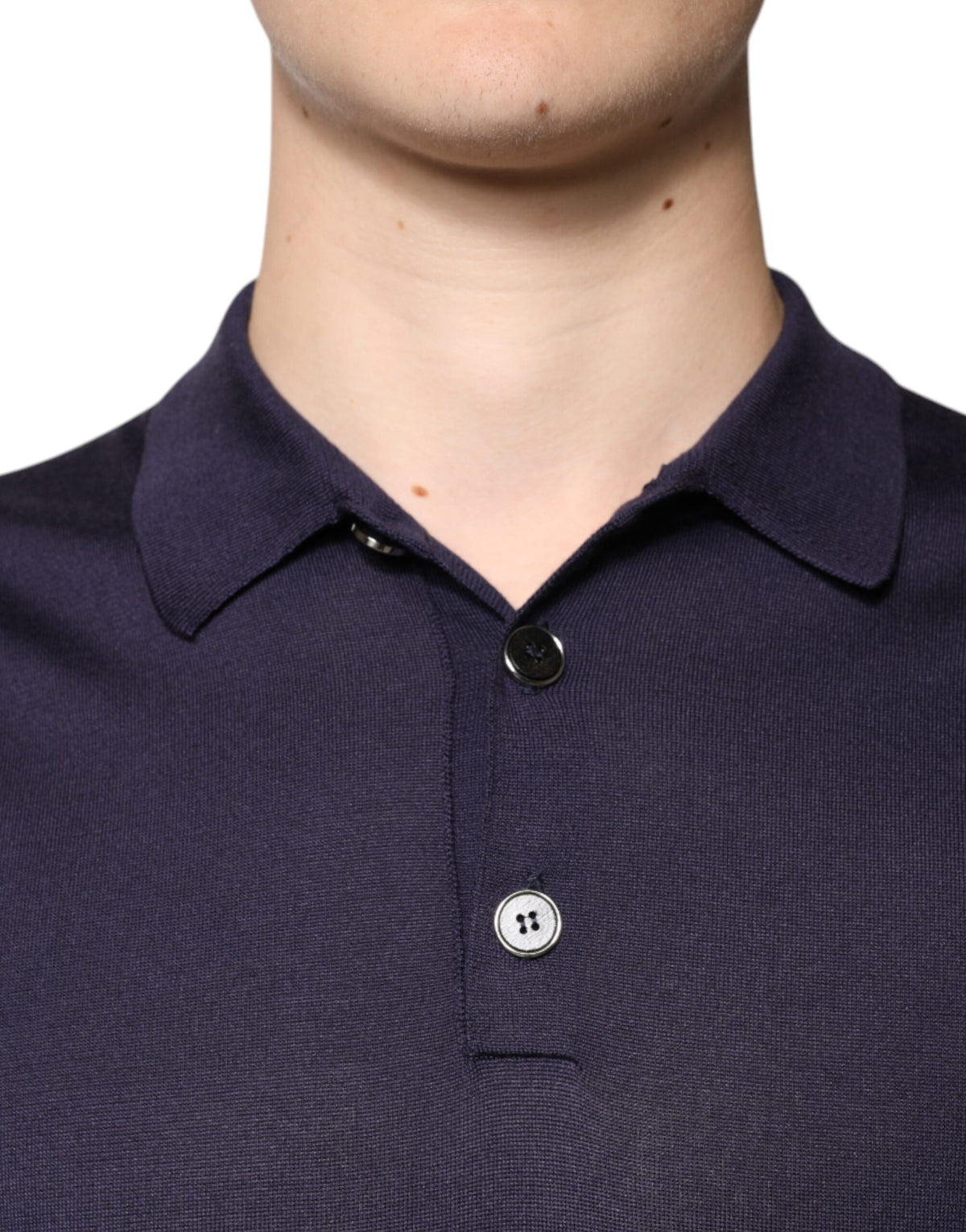 Indulge in the exquisite Dolce & Gabbana Blue Silk Collared Short Sleeves Polo T-shirt, a testament to Italian craftsmanship that elevates your style with timeless elegance.