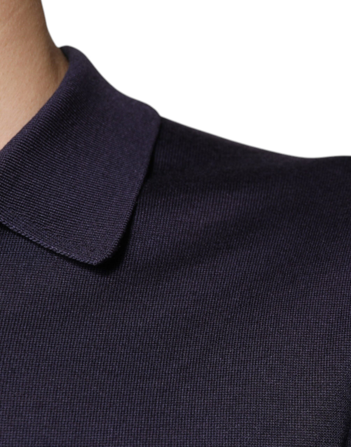 Elevate your wardrobe with the Dolce & Gabbana Blue Silk Collared Polo T-shirt, a symbol of Italian craftsmanship that embodies timeless elegance and sophisticated allure.