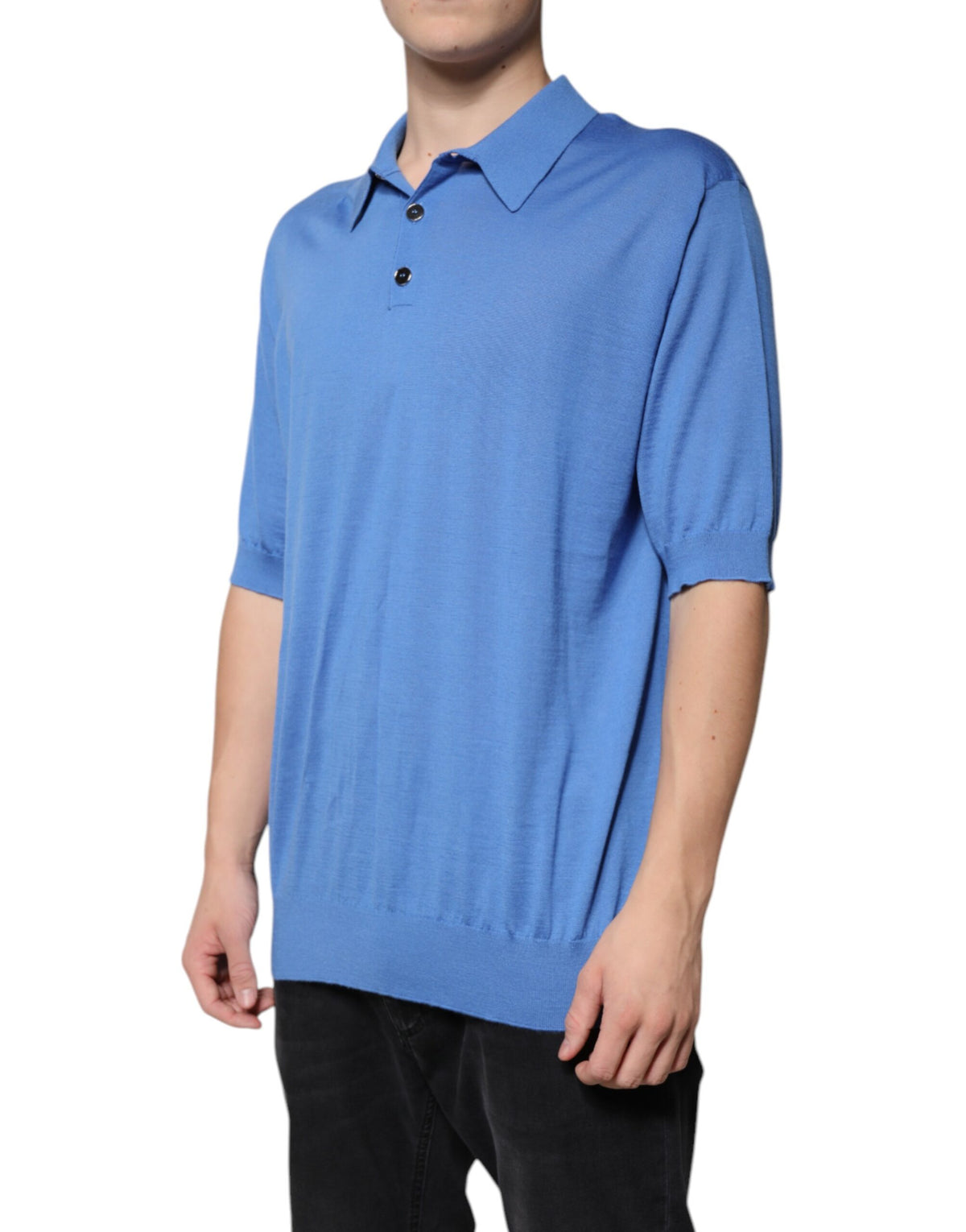 Indulge in the Dolce & Gabbana Blue Collared Short Sleeves Polo T-shirt, a luxurious cashmere masterpiece that redefines elegance and sophistication for the discerning individual.