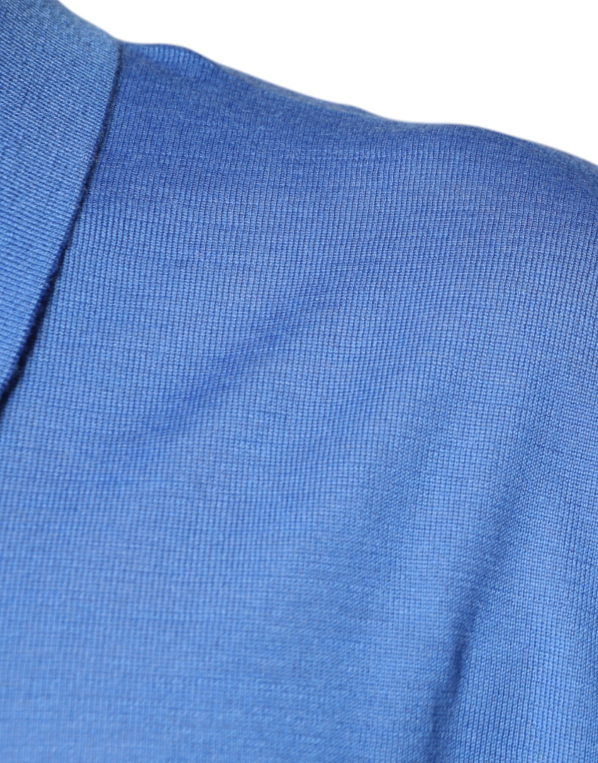 Indulge in the Dolce & Gabbana Blue Collared Short Sleeves Polo T-shirt, a luxurious cashmere masterpiece that embodies timeless elegance and sophisticated allure.