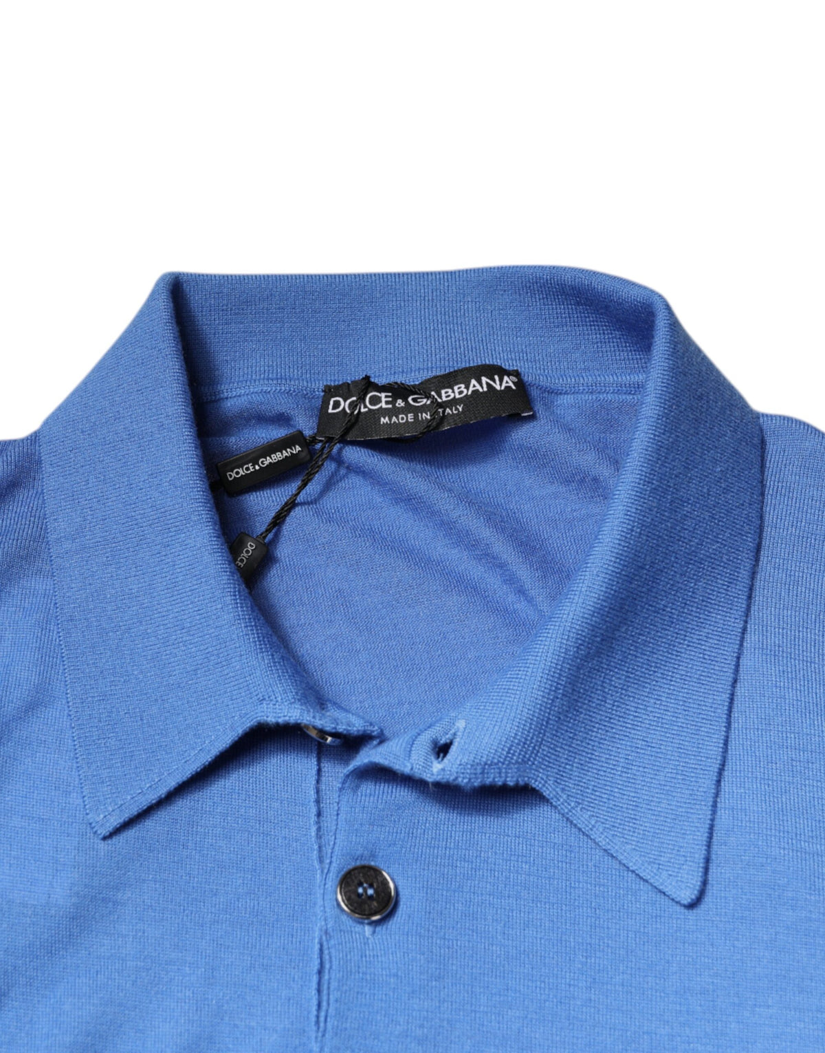 Indulge in the exquisite Dolce & Gabbana Blue Collared Short Sleeves Polo T-shirt, a luxurious cashmere essential that embodies timeless elegance and sophisticated allure.