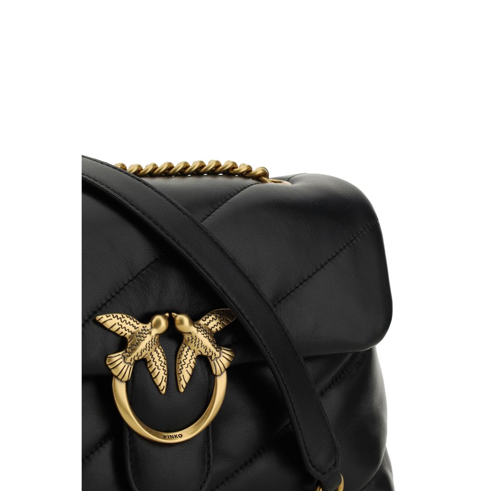 Discover the PINKO Black Calf Leather Bos Taurus Shoulder Bag, a masterpiece of exquisite craftsmanship and timeless elegance, perfect for the discerning individual.