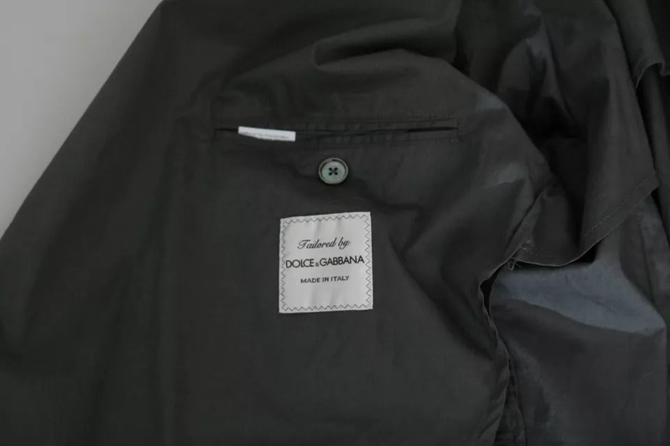 Elevate your elegance with the Dolce & Gabbana Gray Cotton Single Breasted Formal Blazer, a masterpiece of Italian craftsmanship that embodies timeless luxury and sophistication.