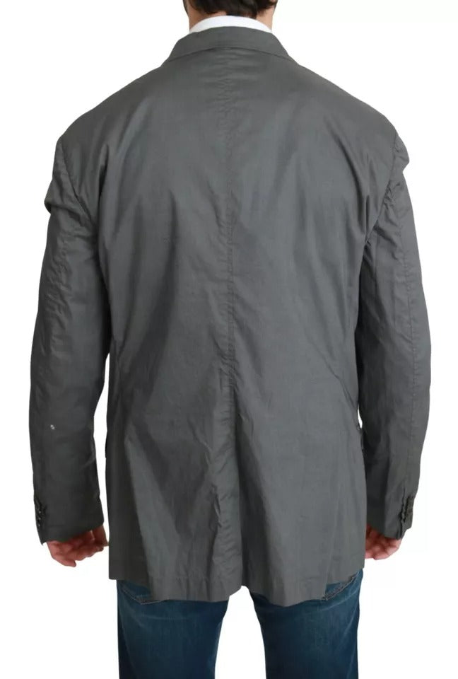 Discover the Dolce & Gabbana Gray Cotton Single Breasted Formal Blazer, a masterpiece of Italian craftsmanship, blending timeless elegance with luxurious comfort for the discerning individual.
