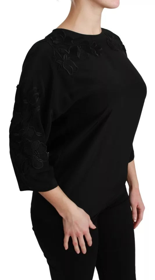 Discover the Dolce & Gabbana Black Floral Embroidered Blouse, a silk masterpiece that epitomizes elegance and sophistication, perfect for the discerning individual.