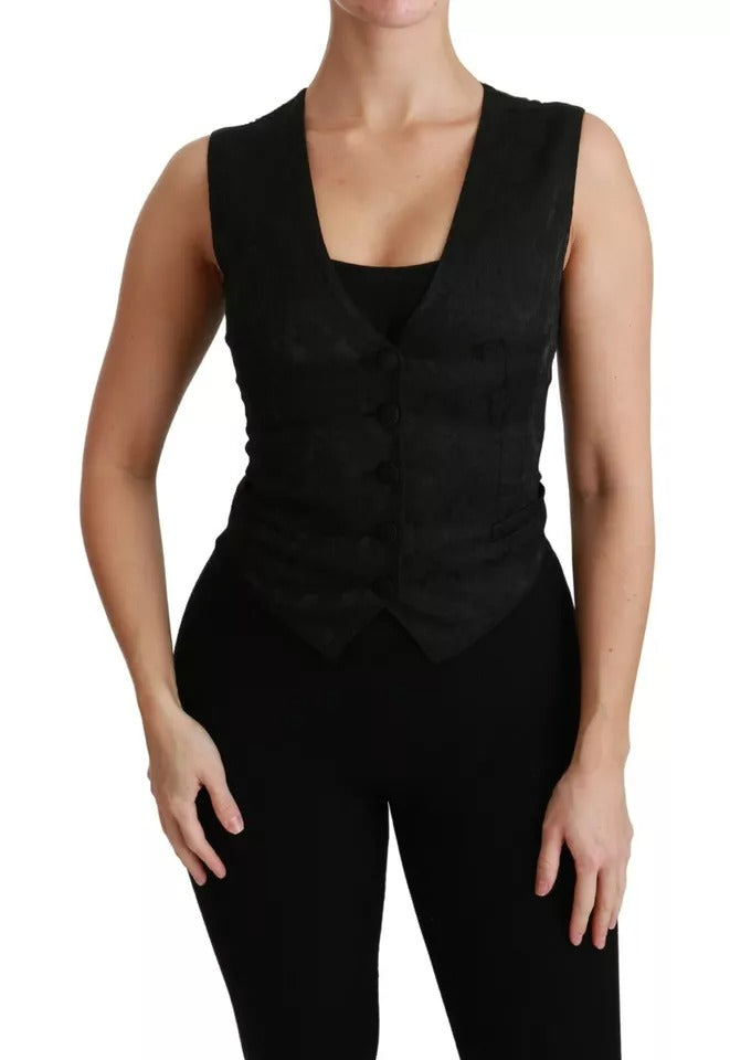 Elevate your wardrobe with the Dolce & Gabbana Black Lace Waistcoat Slim Vest, a masterpiece of silk and lace that embodies timeless elegance and sophisticated allure.