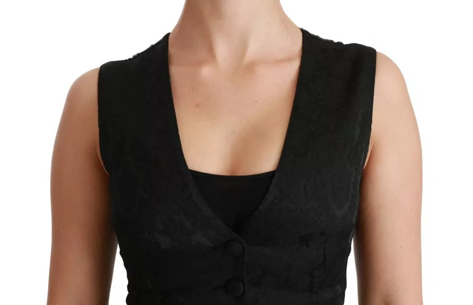 Indulge in the exquisite allure of the Dolce & Gabbana Black Lace Waistcoat Slim Vest, where luxurious silk and lace craftsmanship elevate your style to new heights of sophistication.