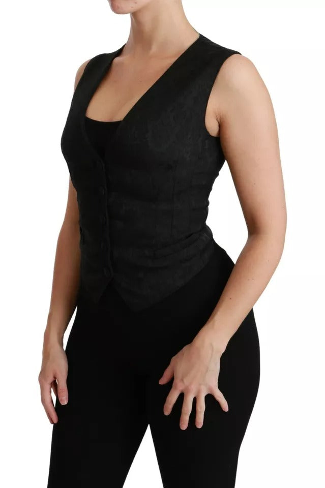 Indulge in the exquisite allure of the Dolce & Gabbana Black Lace Waistcoat Slim Vest, crafted in Italy from luxurious silk and lace, embodying timeless elegance for the discerning individual.